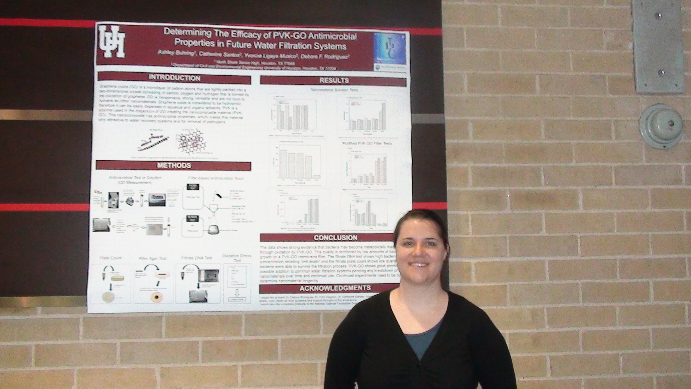 Ashley I. Buhring: presenting her research poster at the end of the UH-RET program Ashley I. Buhring: presenting her research poster at the end of the UH-RET program
